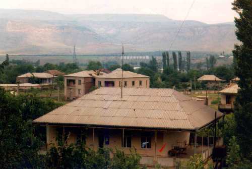 Omar's house with Kankasw mountains in the background.