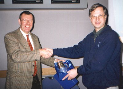 Mike, G3OIL (left) presenting Chris, G3WOS with an inscribed tankard in recognition of his valuable service as UKSMG Chairman.